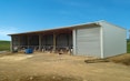 Stand-Tough™, lean-to, 5 bays clearspan with enclosed bays farm building