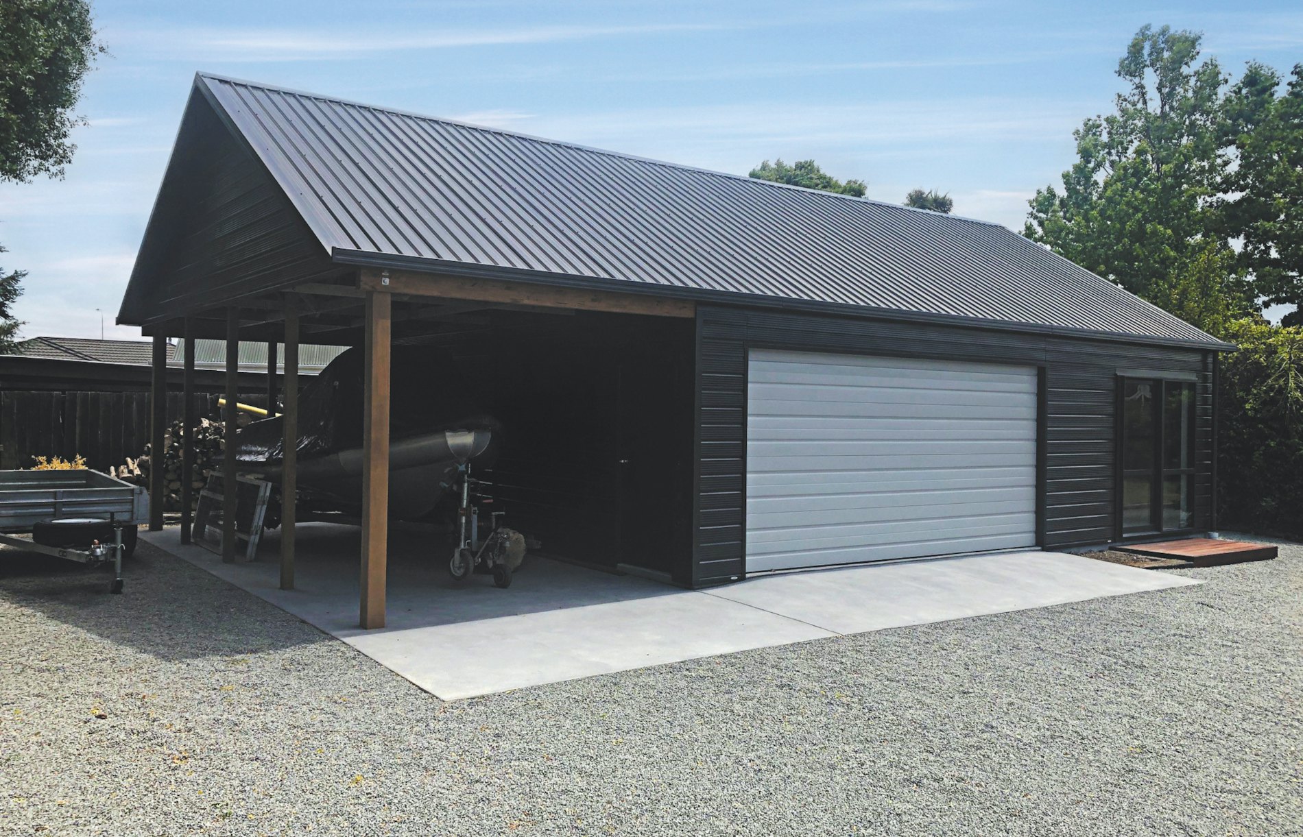 12m(l) x 7m(w), 2.4 stud, double garage with sleepout & garaport, Superclad™ cladding.