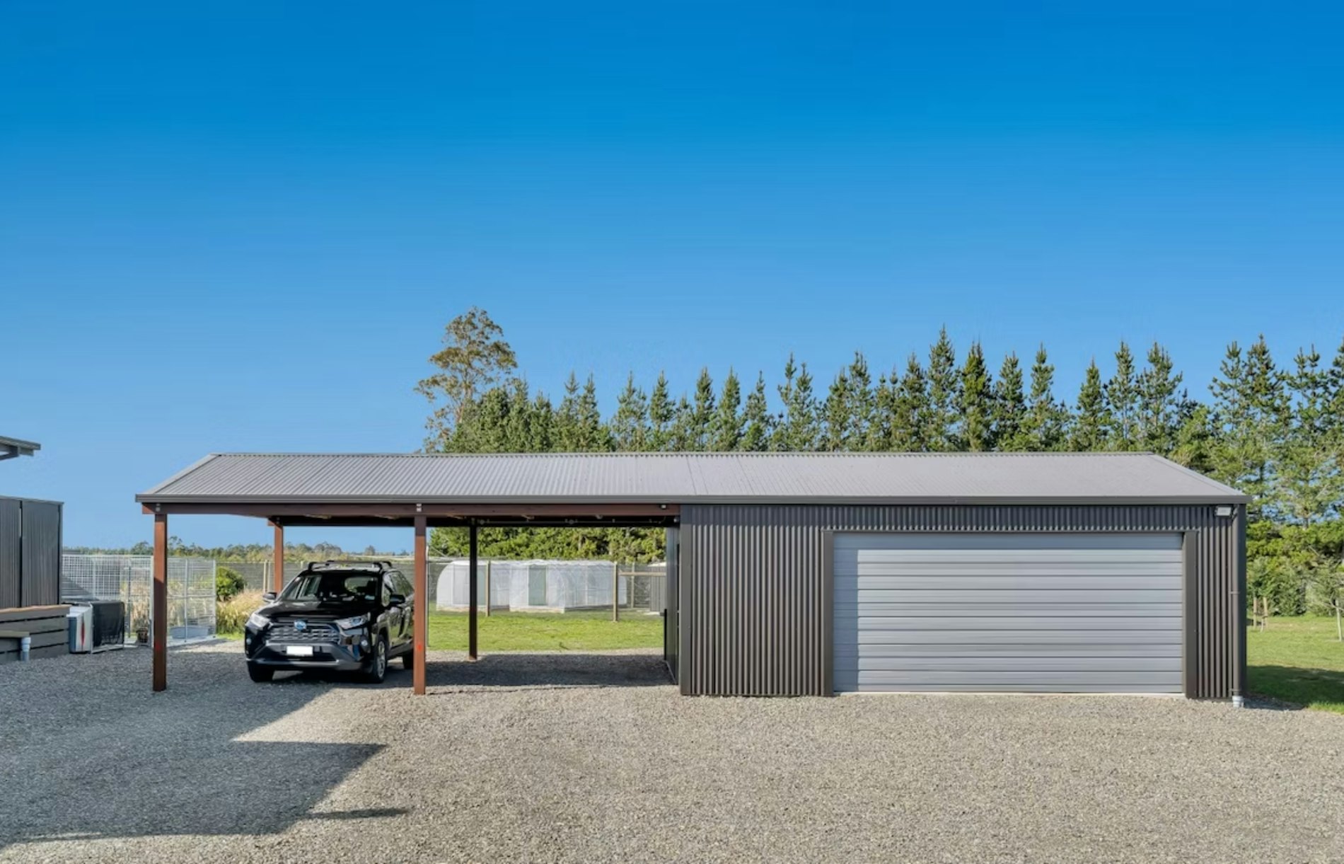 14.4m x 6.0m x 2.4 stud height garage with carport, 6-Rib Corrugate cladding in COLORSTEEL® Ironsand.