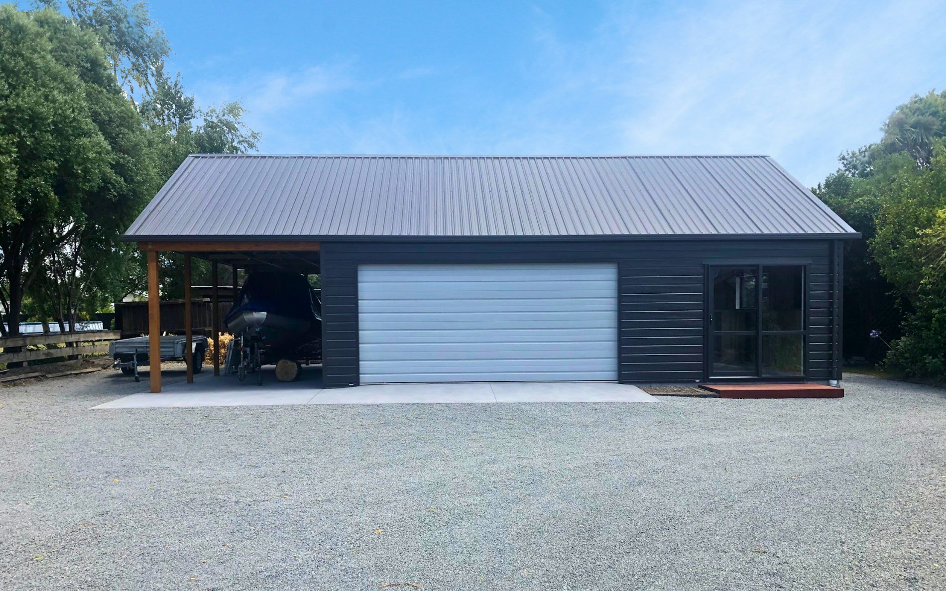  12m x 7m custom garage with sleepout and carport 