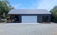  12m x 7m custom garage with sleepout and carport 