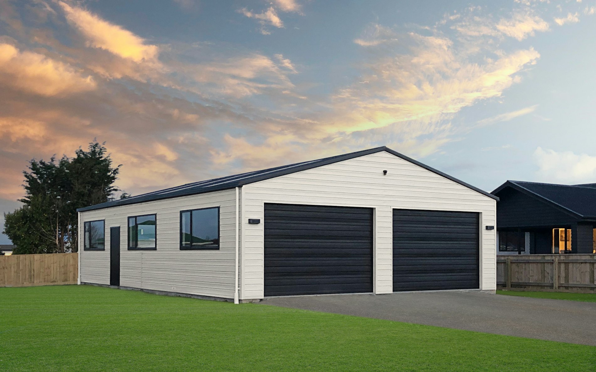 13.2m x 9m x 2.7m stud custom garage Superclad li Windows. Desert Sand with Tempest roof gutter and trim