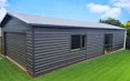 13.5m x 6m garage with a model train room to the back