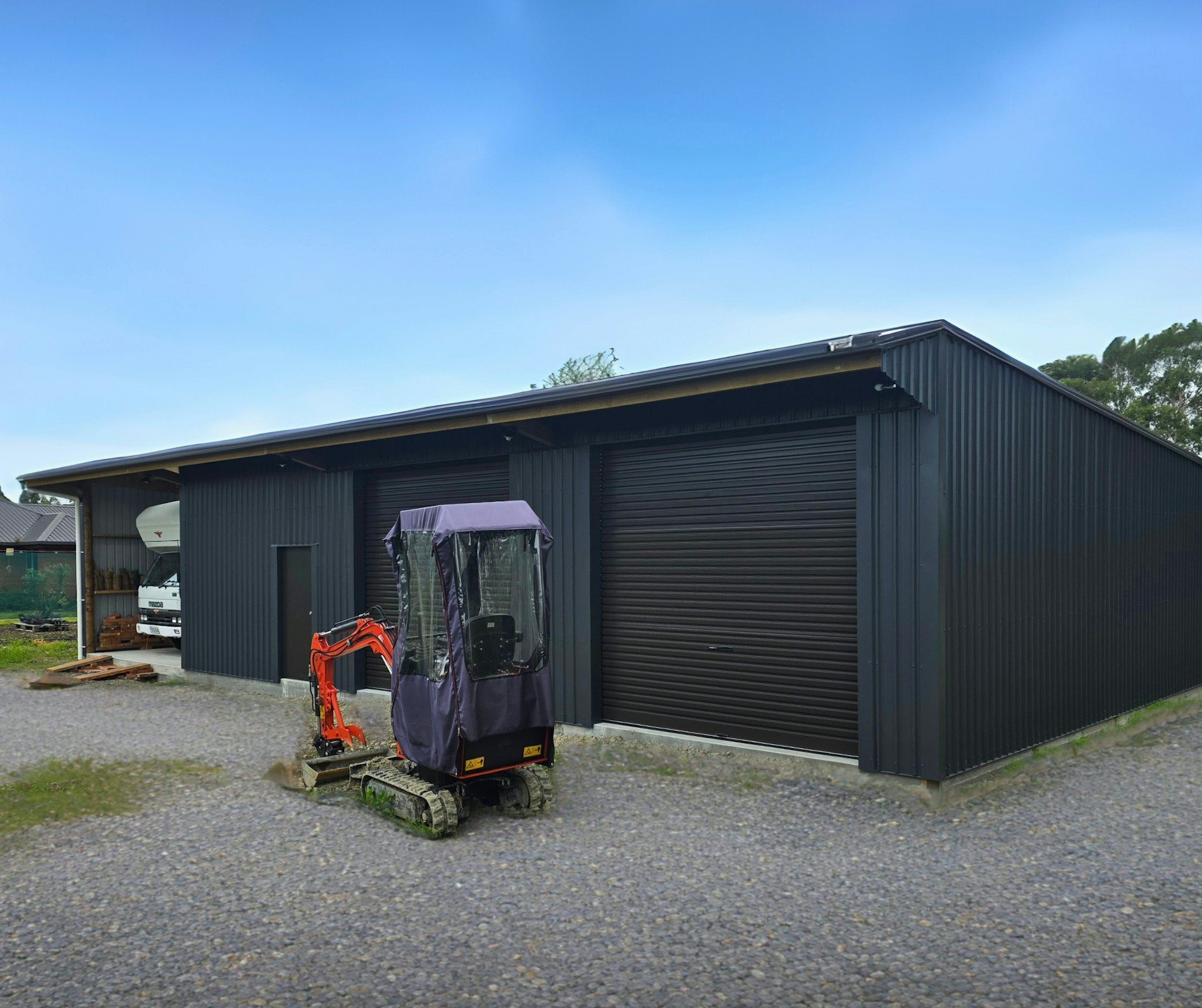 16.8m x 8.95m x 3.6m four-bay farm building, finished in COLORSTEEL® Grey Friars cladding with Ironsand doors,