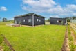 10m x7m garage and sleepout with a luxurious ensuite bathroom, mono-pitch roof and Colorsteel Maxx superclad cladding