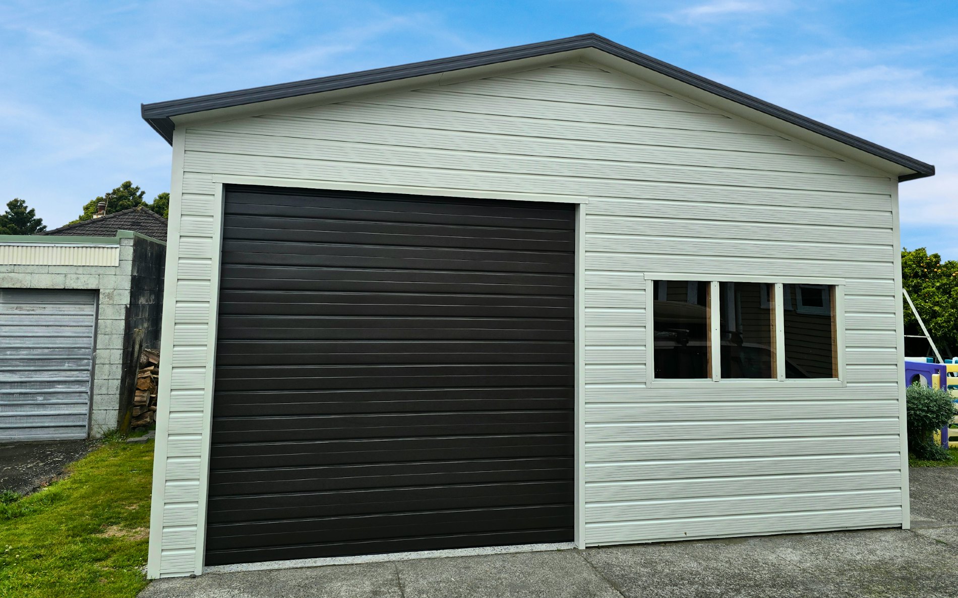 6m x 6 x  3m H stud, Super clad cladding in Titiana and Ironsand door.