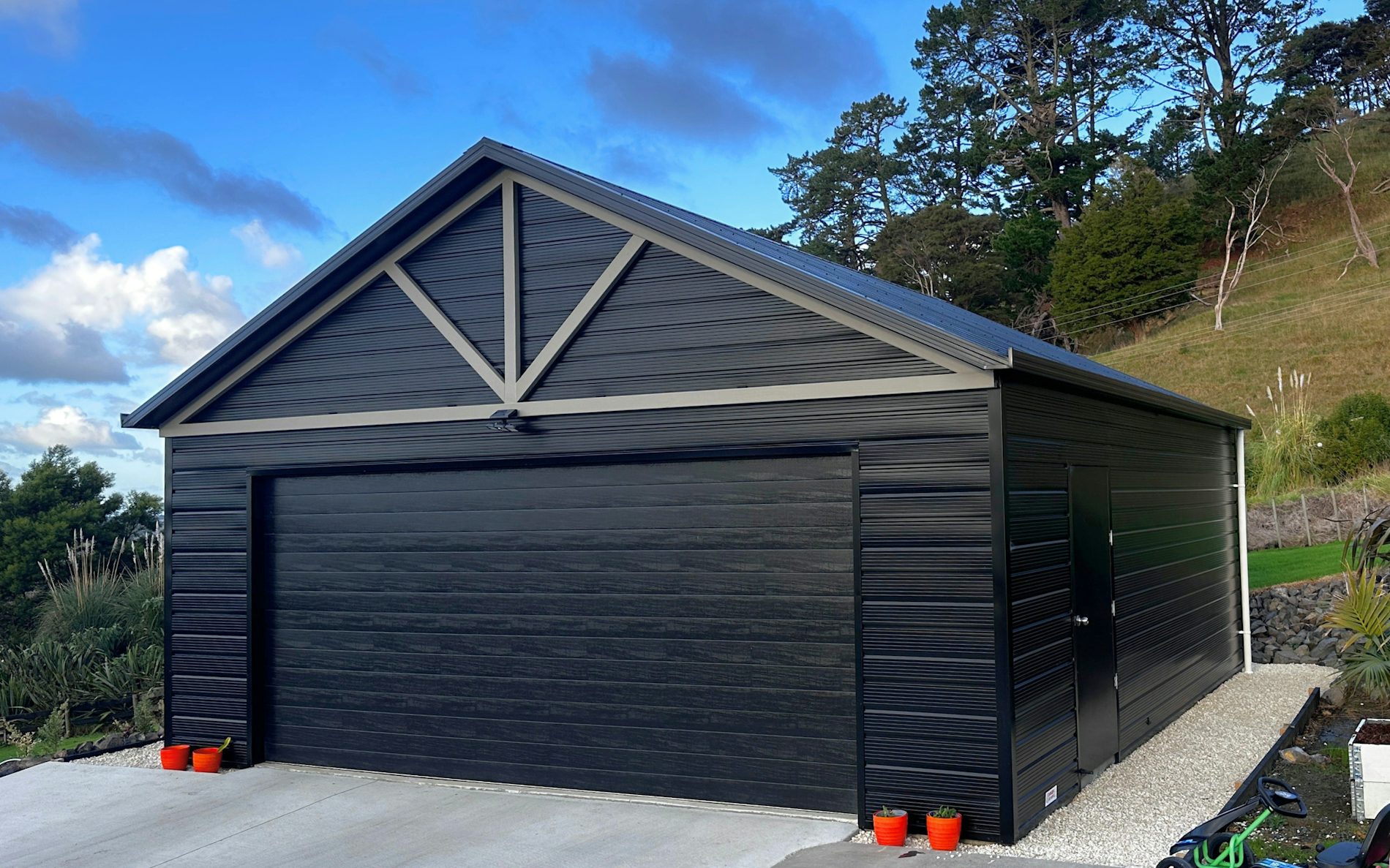 7.2m x 6.6m double garage, Superclad™ cladding in COLORSTEEL® Ebony