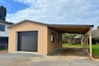 7.2 x 4m brick garage with carport