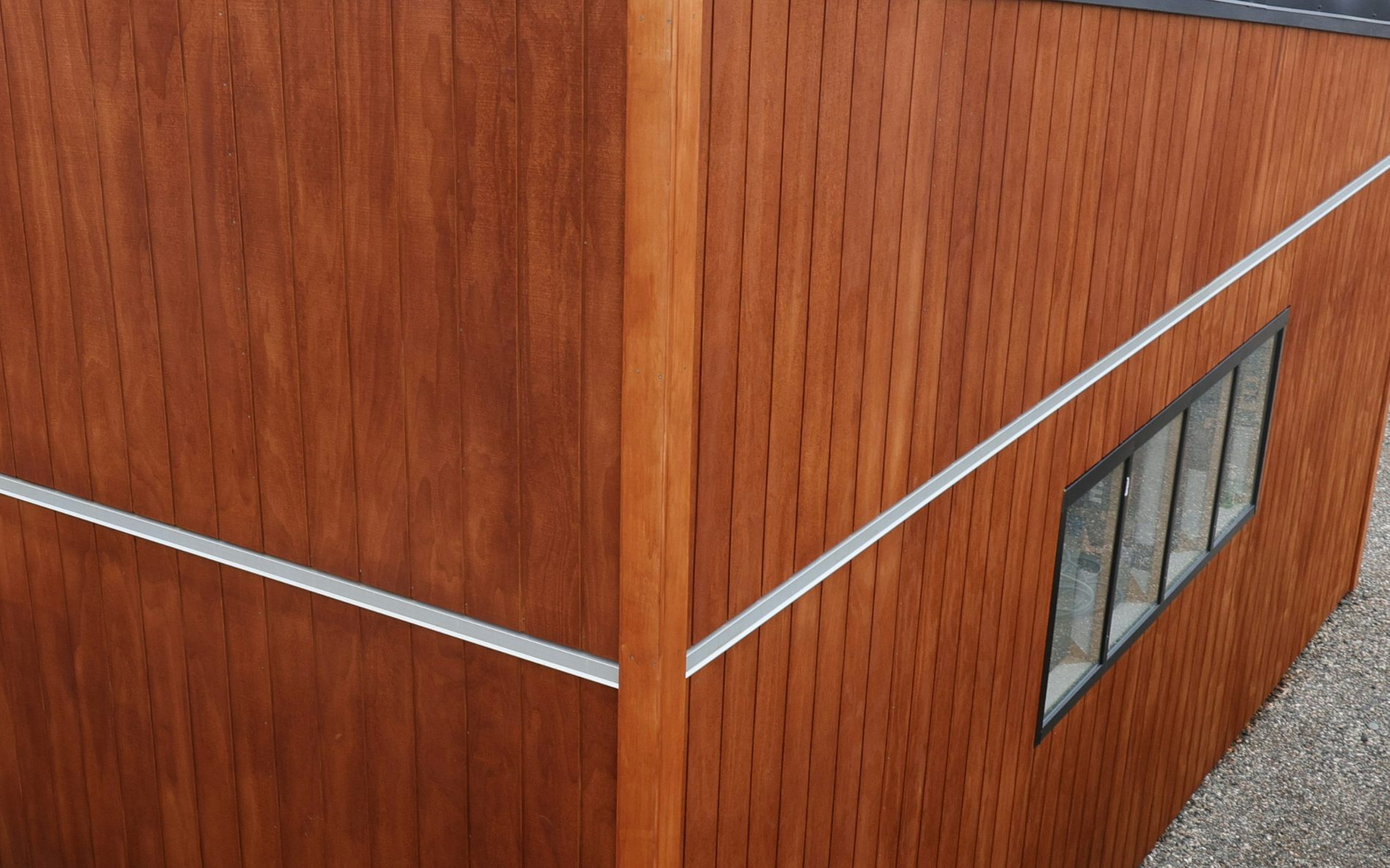 7m x 7.2m custom garage and storage, mono-pitch roof design in conjunction with stained shadowclad cladding