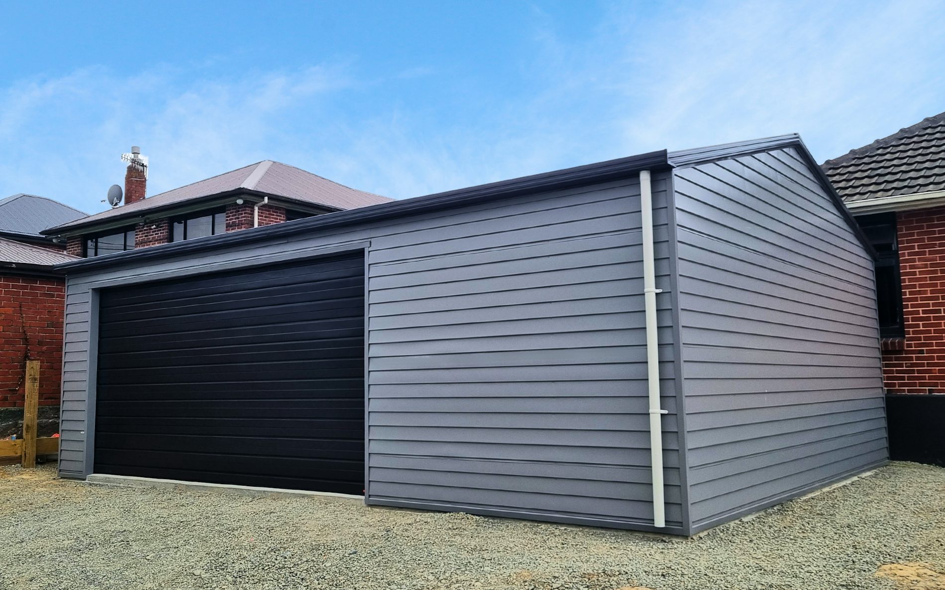 8m x 6m Kitset double garage, Versaclad cladding  in COLORSTEEL® Sandstone Grey and Flaxpod  door  