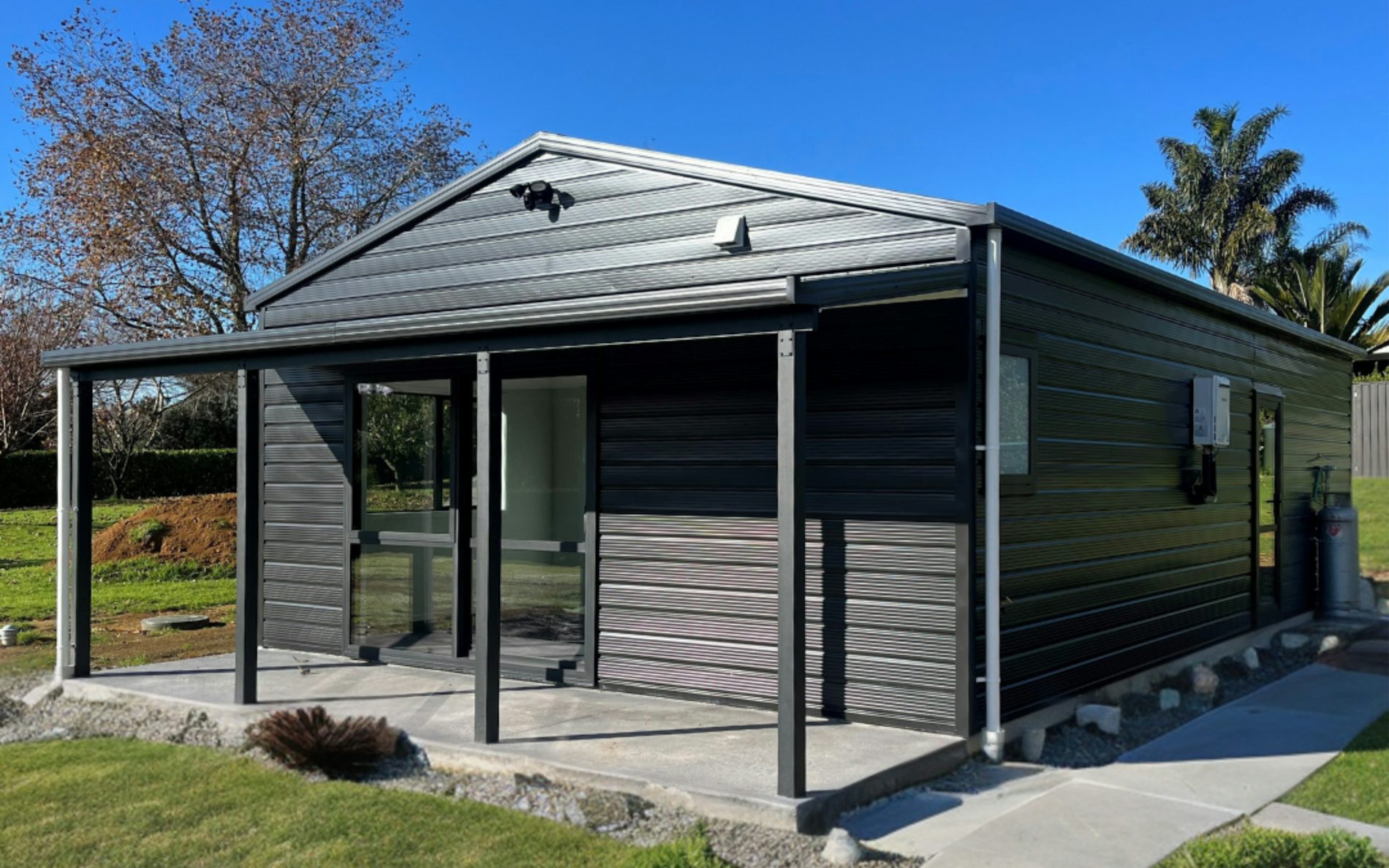 9.6m x 6.0m garage with sleepout, Superclad cladding in COLORSTEEL® FlaxPod