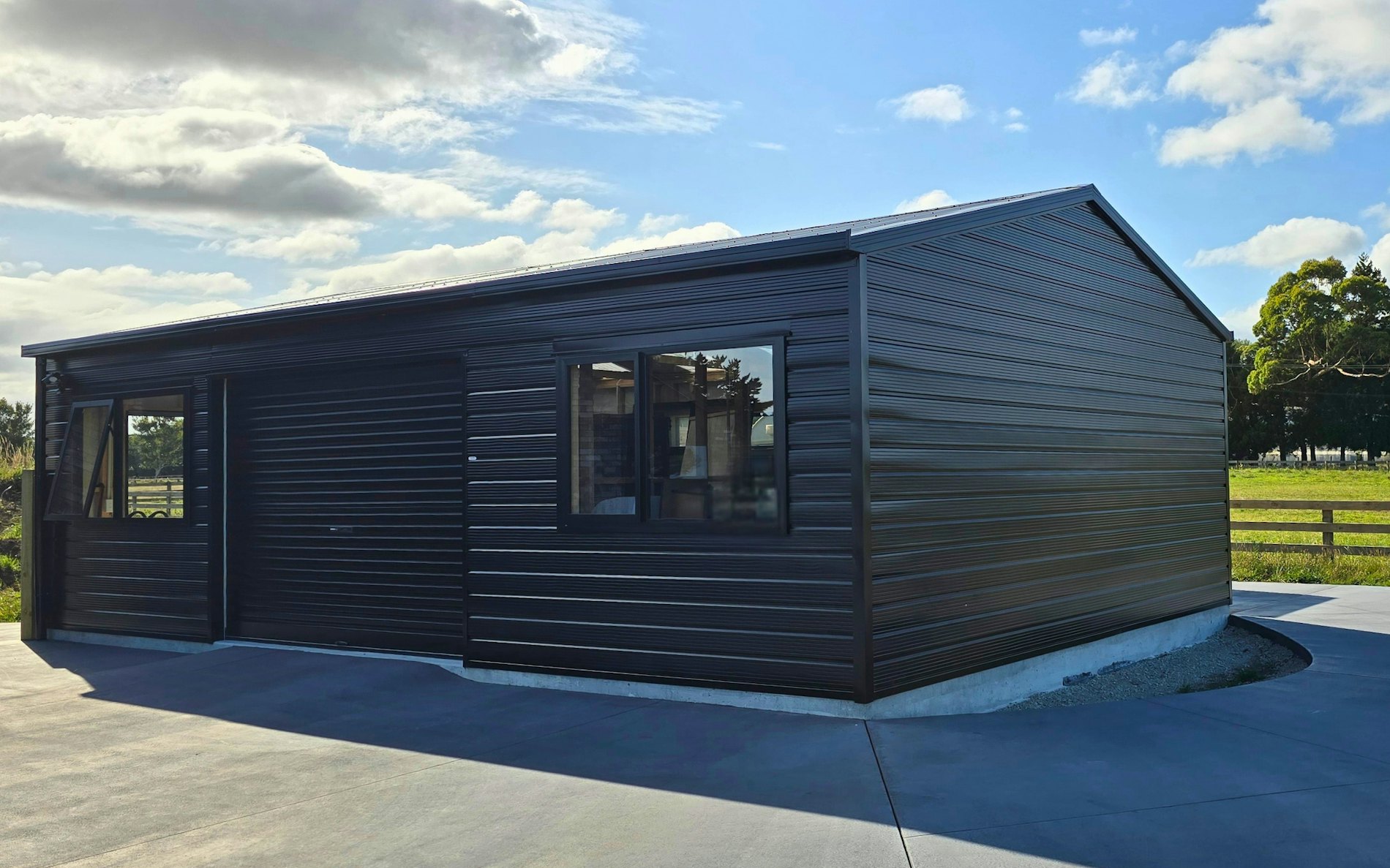 9m x 6m double garage with 2 hobbies rooms, Superclad cladding in Ebony