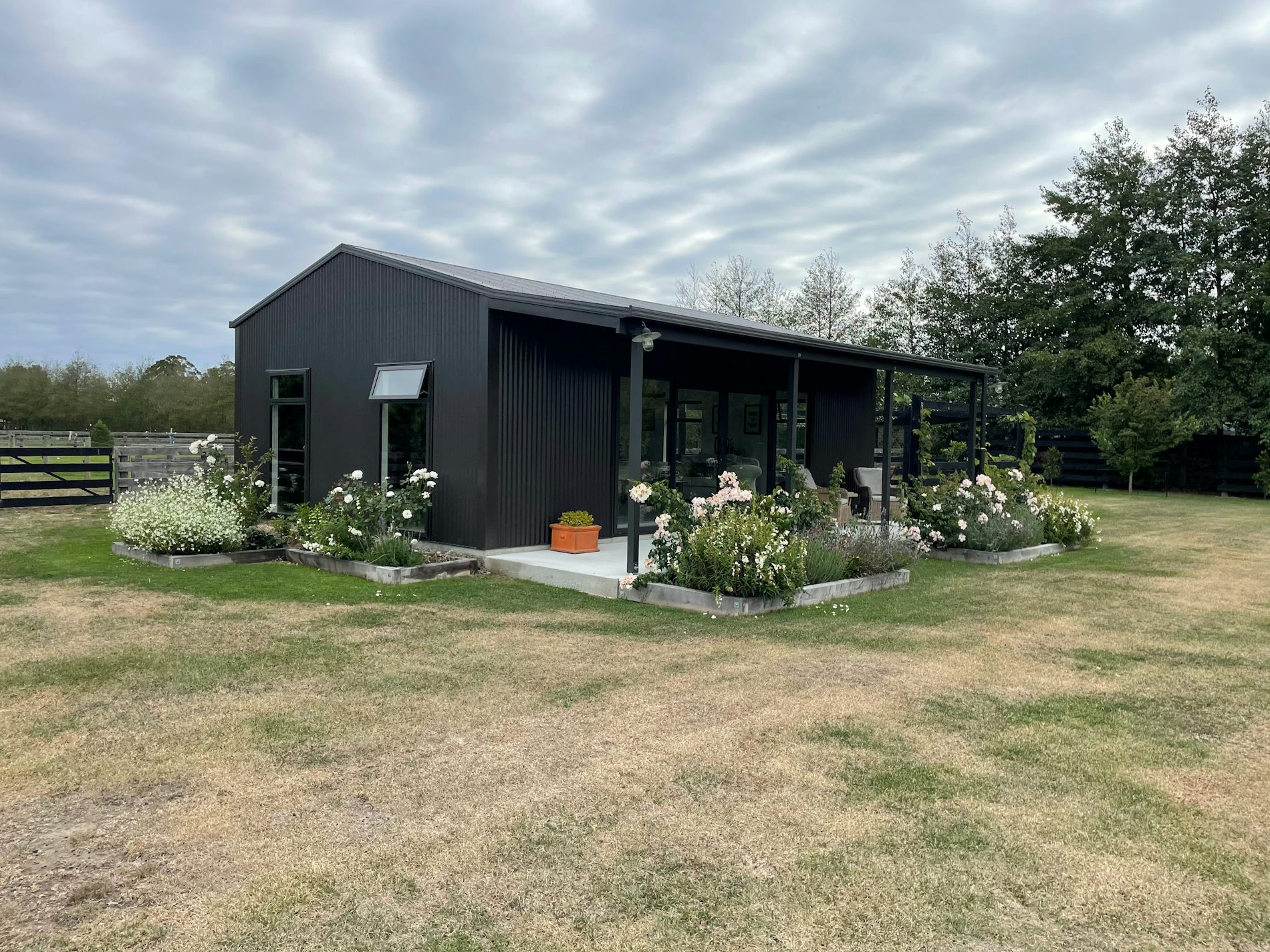 9x6m x2.7m shed with a 2m Verandah, Corrugate cladding and roofing in Ironsand 