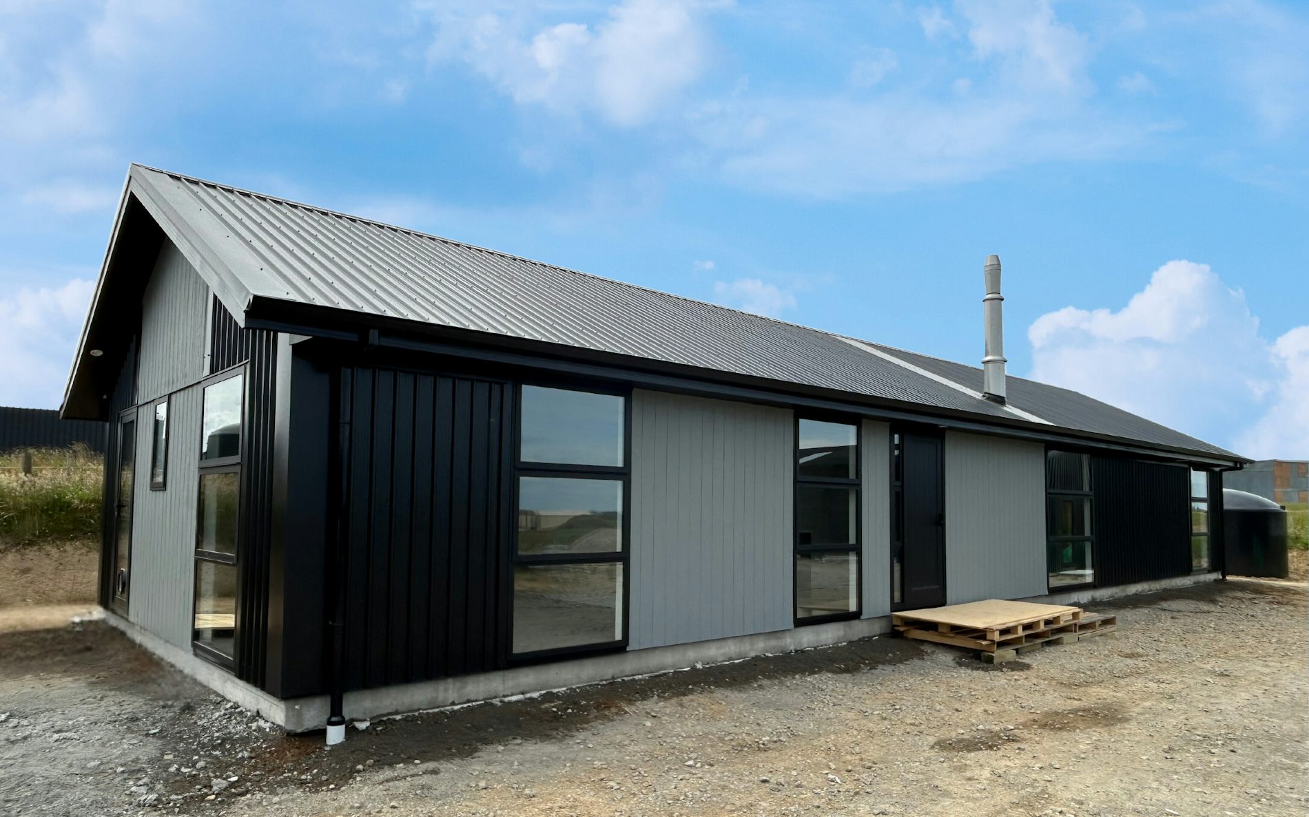 Modified version of the Hillary plan from Family Range, 3-bedroom layout and striking Vertical 6 Rib and BGC Duragroove Cladding