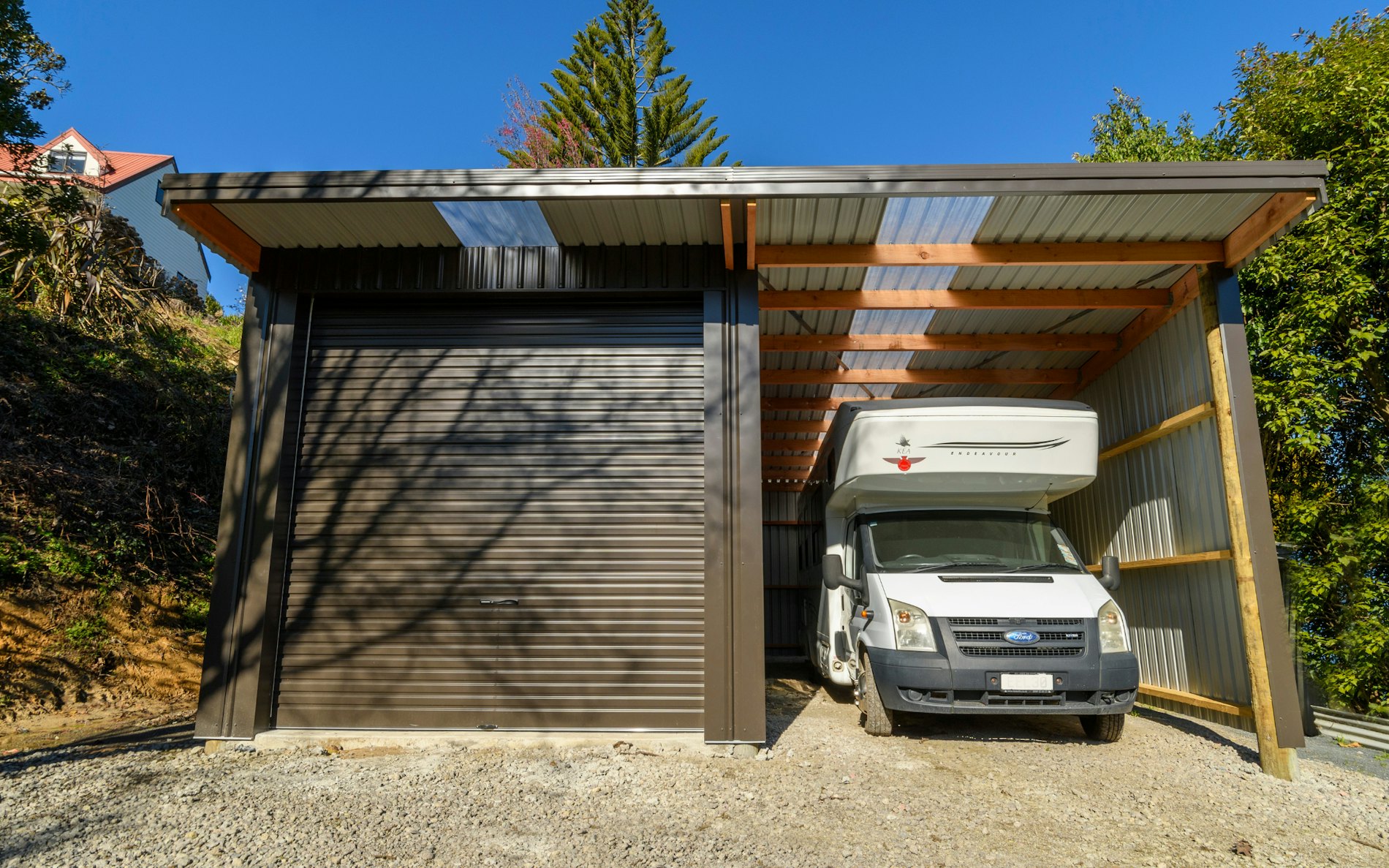 Stand-Tough™, 3.6mh x 7.95md x 7.2mw lean to with one roller door farm building