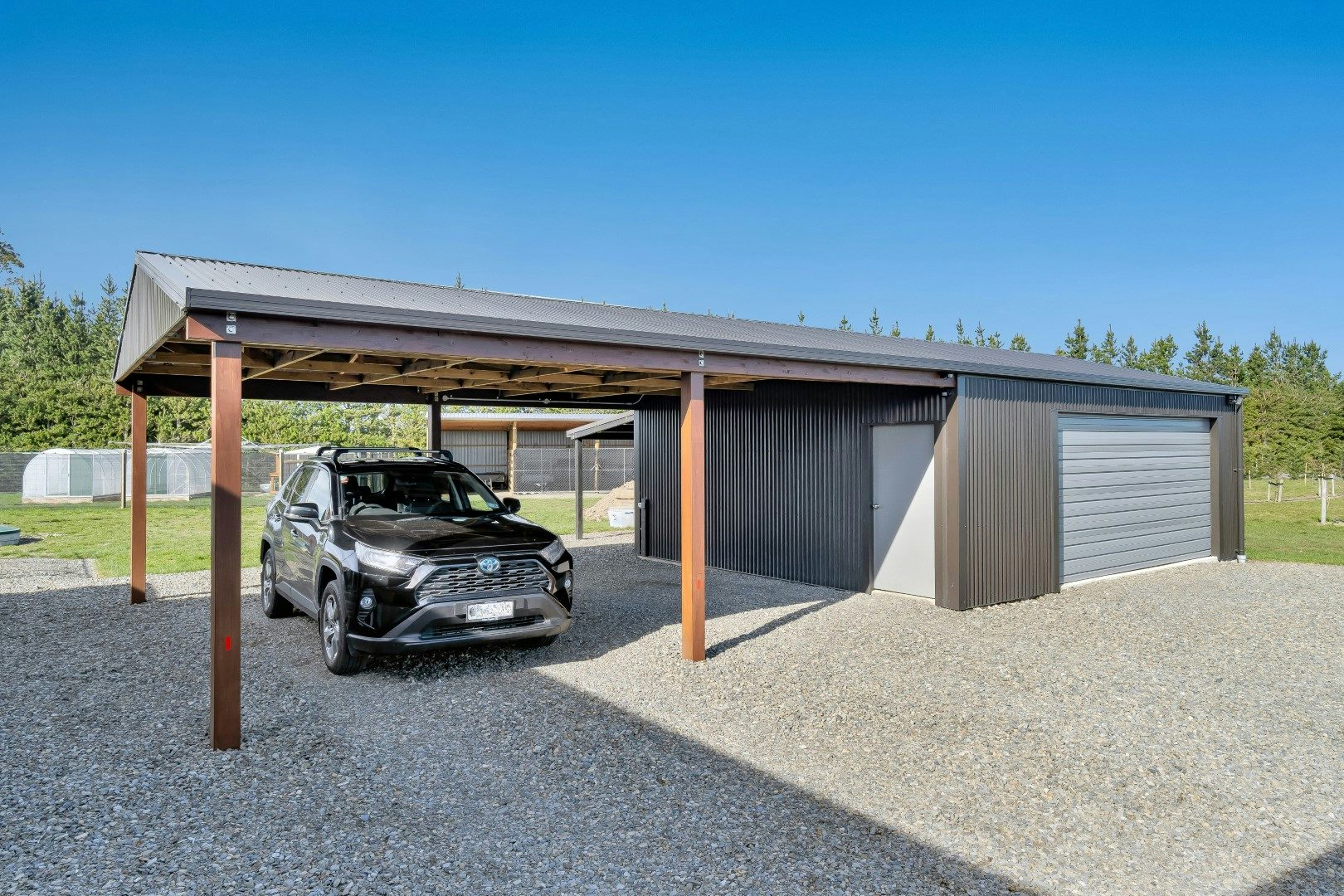 Chch - 9x6m Superclad, Roof Ebony, Walls Flaxpod, Door Sandstone